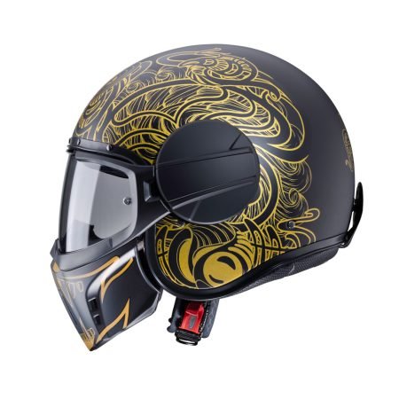 GHOST-MAORI-MATT-BLACK-GOLD-PROFILE Casco jet Caberg Ghost Maori nero opaco e oro, vista laterale, design aggressivo con grafica Maori.